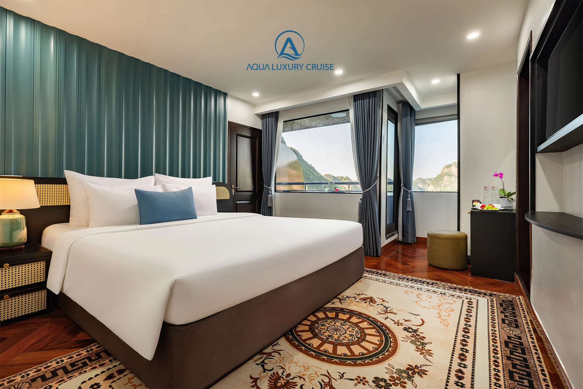 Junior Suite Balcony cabin with a double bed on Aqua Luxury Cruise